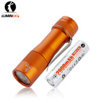 Lumintop FW3A orange aluminium EDC flashlight with pocket clip beside a 2900mAh 18650 battery.