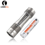 Lumintop FW3A titanium flashlight in a natural finish with pocket clip beside a 2900mAh 18650 battery.