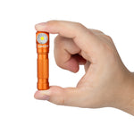 Lumintop L3 mini angle flashlight orange compact tiny size finger pinch grip LED emitter diagonal knurling white background