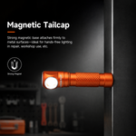 Lumintop L3 mini angle flashlight orange magnetic tailcap strong magnetic base attaches to metal surface hands-free work light repair workshop dark background