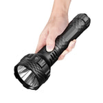 Lumintop PK90 long range flashlight black hand held one-hand grip diamond knurling side switch HOT warning large reflector white background