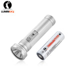 Lumintop Tiger vintage style modern performance flashlight silver 4000 lumens 485 meters 26800 Li-ion dual-switch control retro oil lamp dark indoor background
